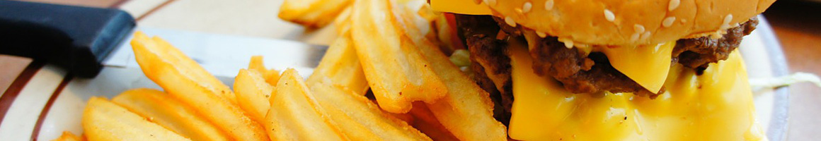 Eating American (Traditional) Burger at Backyard Grill restaurant in Chantilly, VA.
